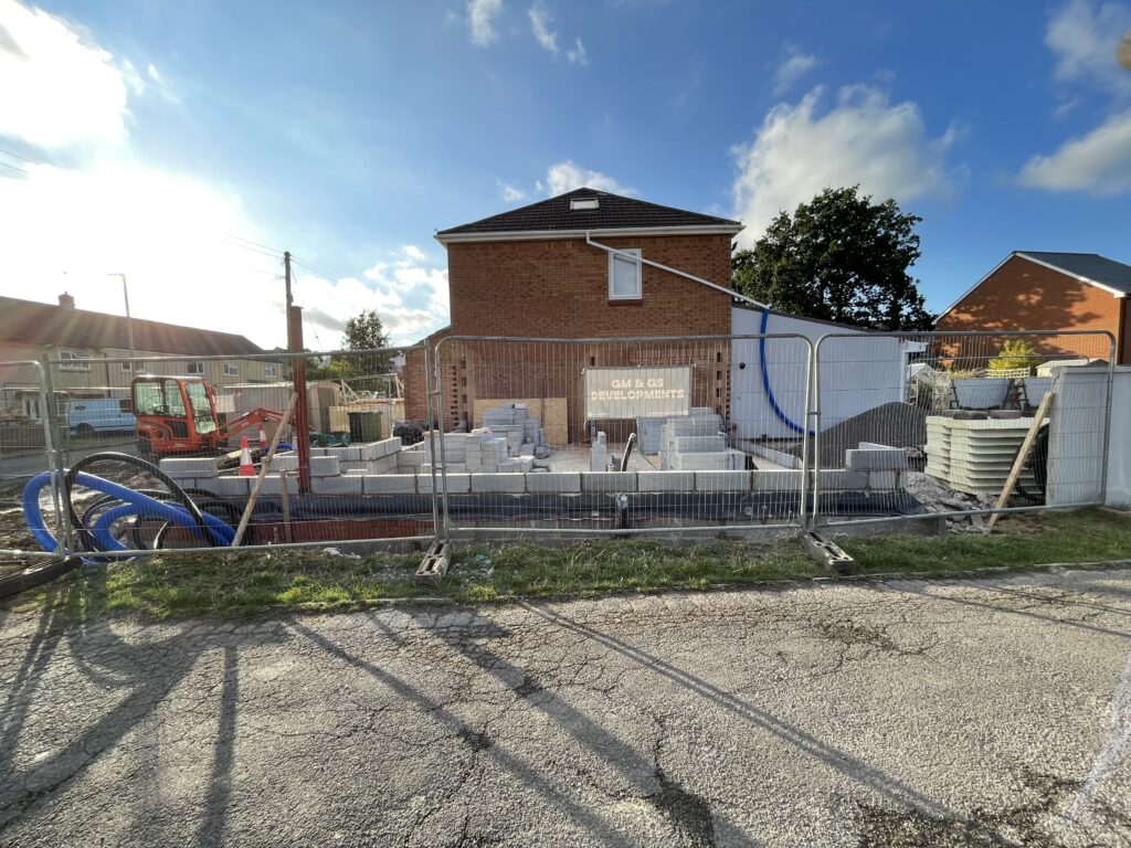 Garage and driveway of new home construction in Bristol