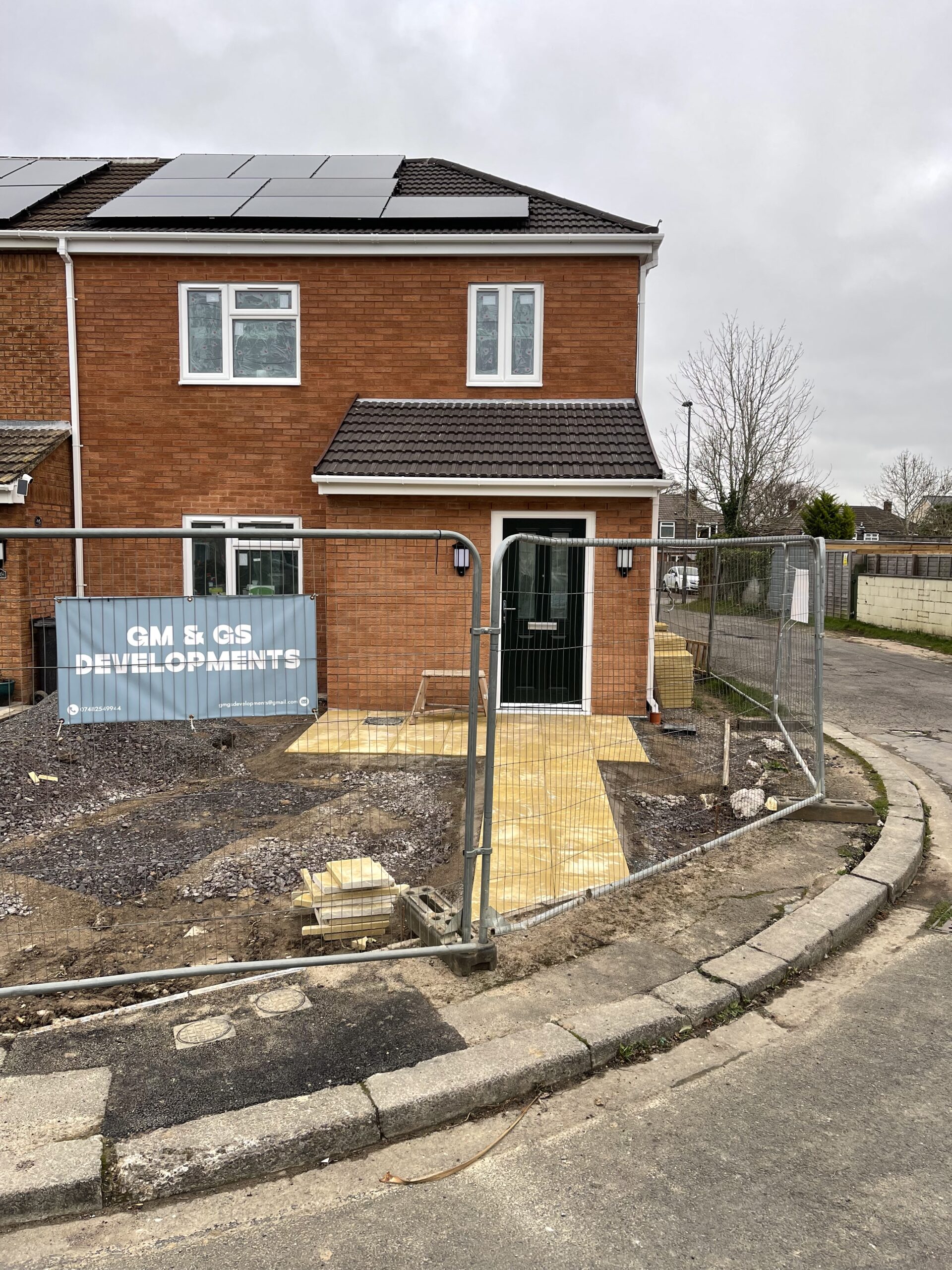 Construction workers building a new residential property in Bristol.